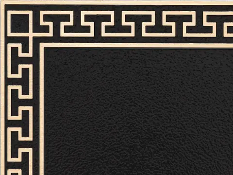 The corner of a sample plaque with the Greek Key decorative border