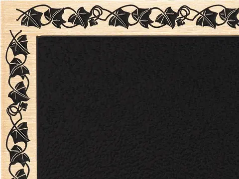 The corner of a sample plaque with the Ivy decorative border, a trailing band of ivy leaves