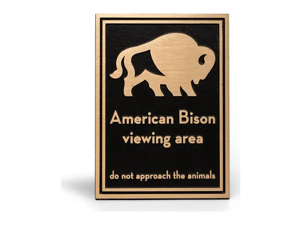 An example of a bronze sign with a raised bison, reading American Bison viewing area
