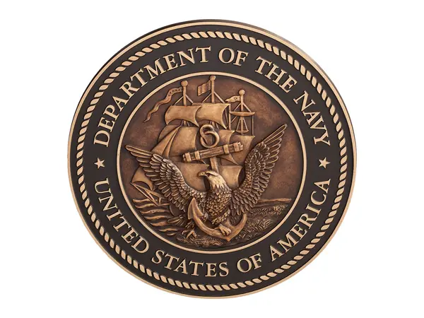An example of a round sculpted bronze seal of the United States Navy