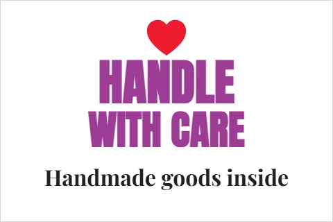 Roll label template, handle with care, handmade inside, reading "HANDLE", "WITH CARE" and "Handmade goods inside", in white