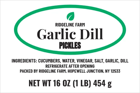 Roll label template, pickles, oval badge, reading "Garlic Dill", "PICKLES" and "NET WT 16 OZ (1 LB) 454 g", in green and white