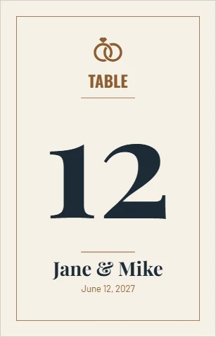 Table tent template, wedding table number, reading "TABLE", "12" and "Jane & Mike", in cream